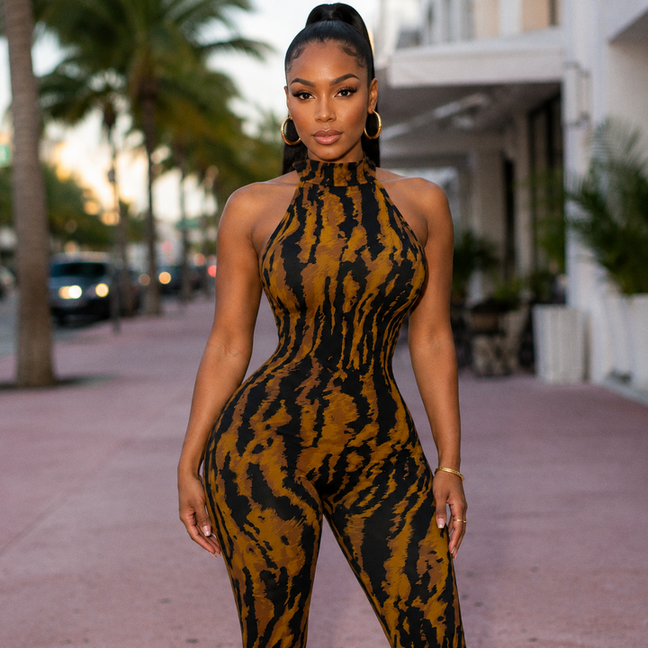 Close-up front view of the Celine Capri in tan and black tiger stripe print with halter mock neckline