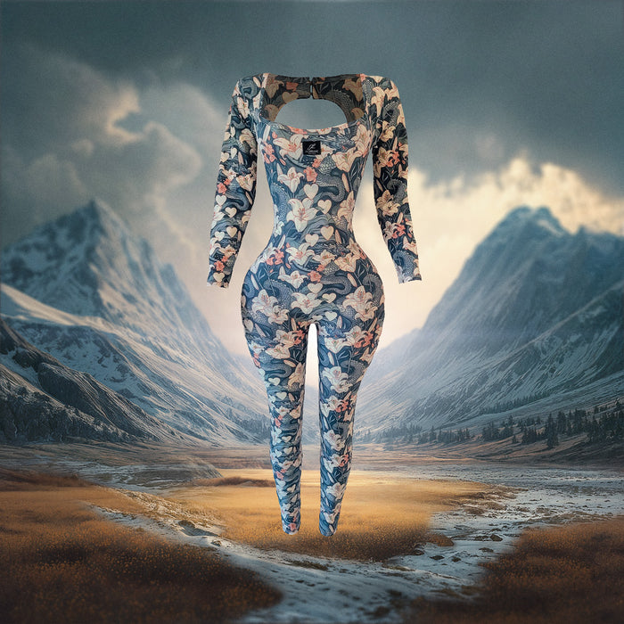 Floral-patterned jumpsuit in a mountainous landscape